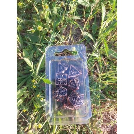 Kit De 7 Dés Métalliques Creux Faces Cthulhu. teinte cuivre rouge