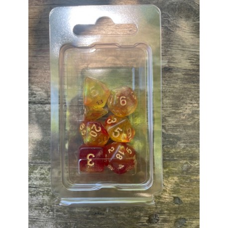 Set de 7 dés pailletés pearl jaunes et rouges encre blanche