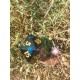 D20 De 5.5 Cm En Résine Couleur Fumé . Print Or . Yeux Multicolores Mouvants